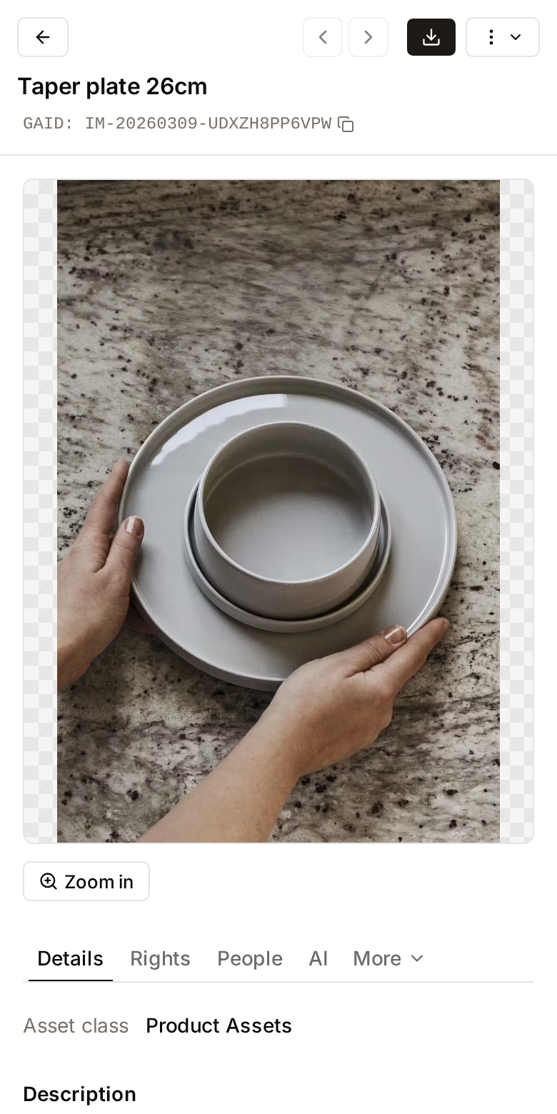 The asset page on a phone: the buttons on one row, the title under them, then the preview and the tabs with More