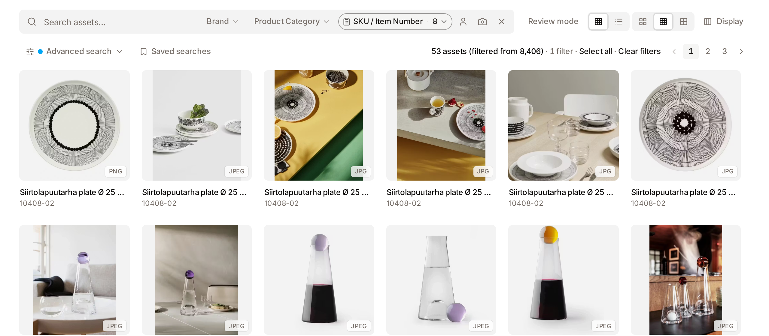 The gallery after a list of SKUs was pasted into the search bar: the SKU quick filter shows the number of values and the grid shows the matching assets.