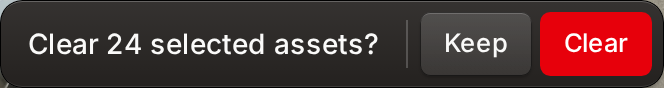 The selection bar asking to confirm before clearing a selection of more than 20 assets, with Keep and Clear
