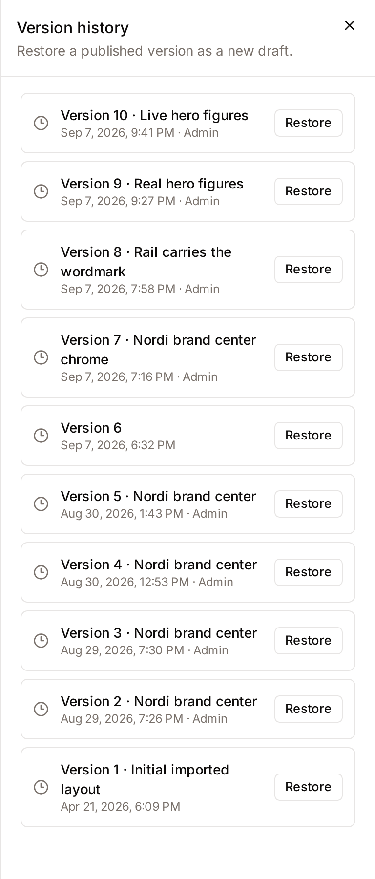 The Version history panel listing the published versions, each with a Restore button